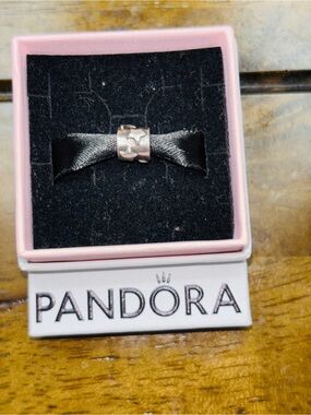 Authentic Pandora Star, Moon, and Sun Charm. (Retired).
